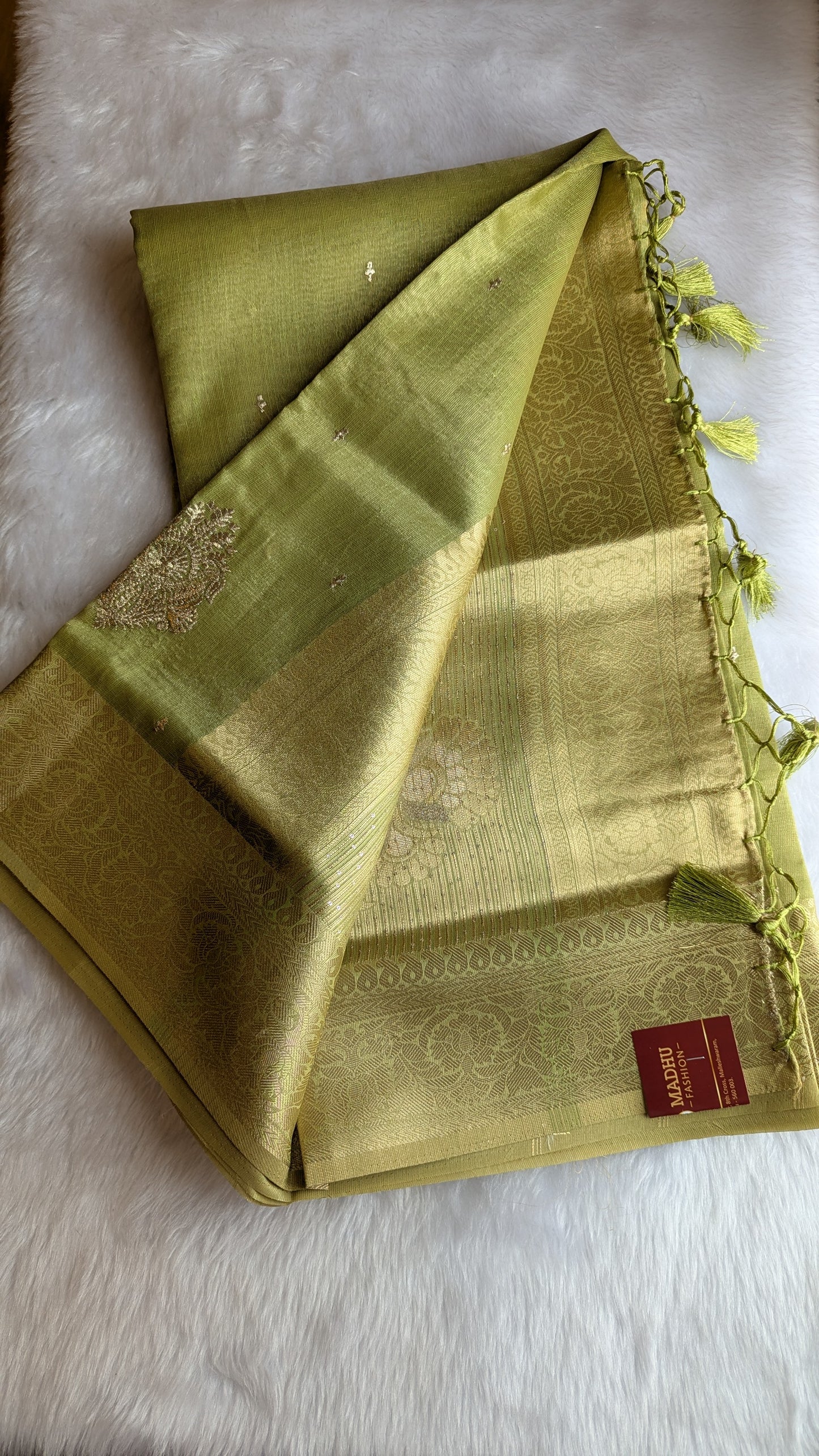 Pista Green color with Golden Jari Border Soft Tissue Saree