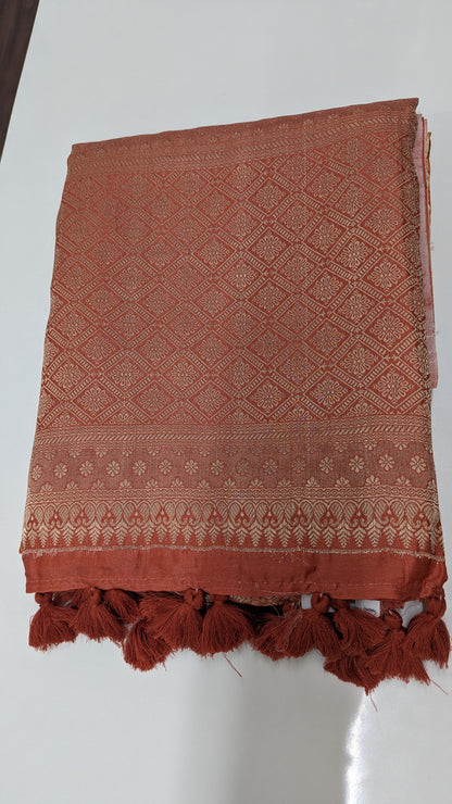 Rust Orange Crepe Silk Saree with Antique Zari