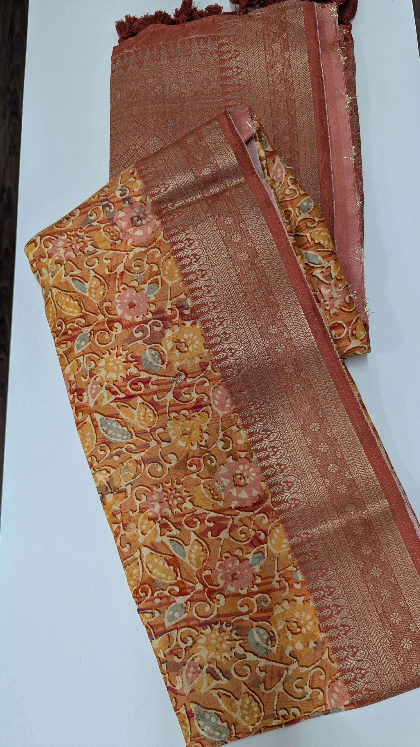 Rust Orange Crepe Silk Saree with Antique Zari