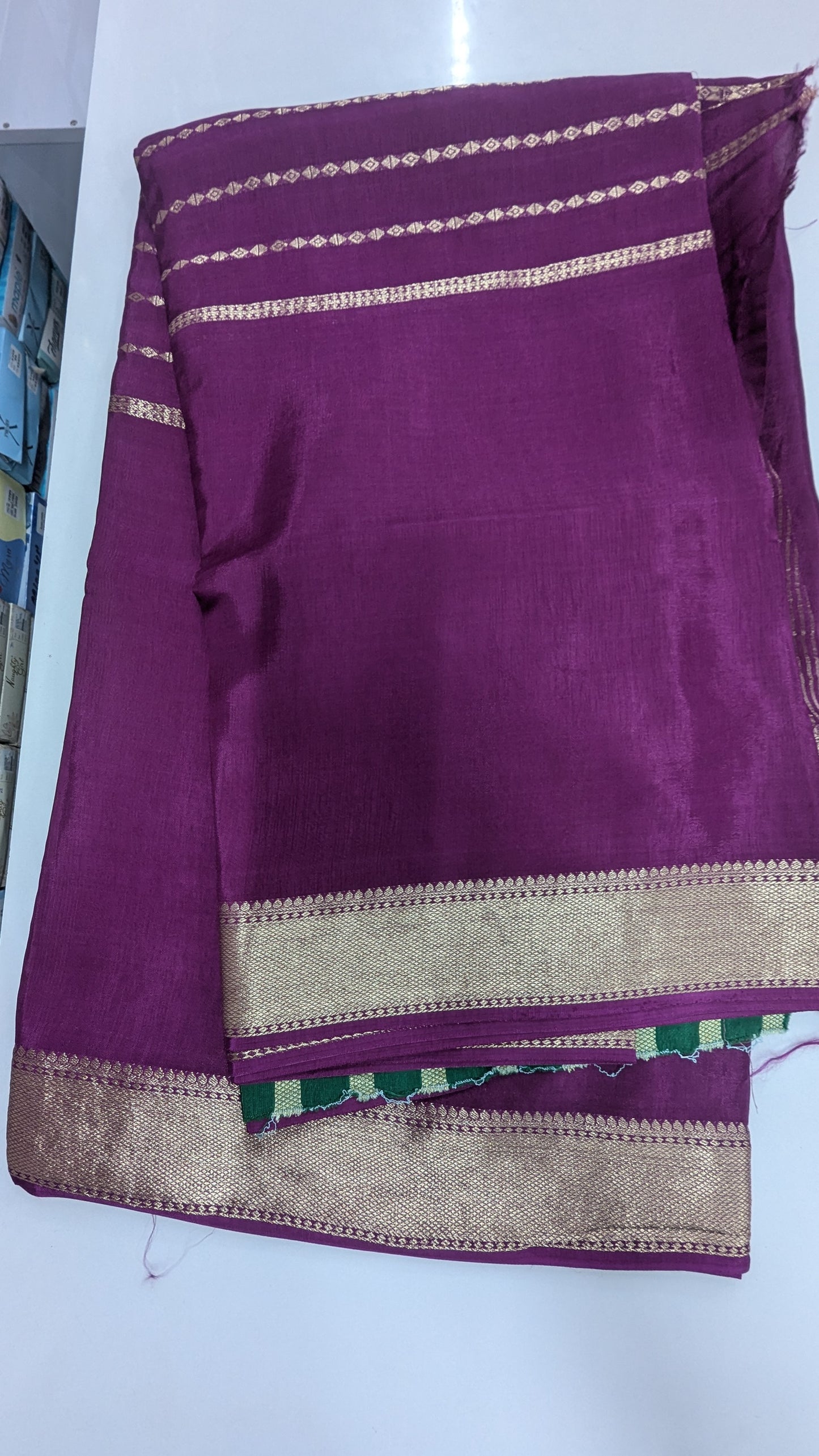 Wine color Semi Crepe Silk Saree with Center Zari Lines and Border