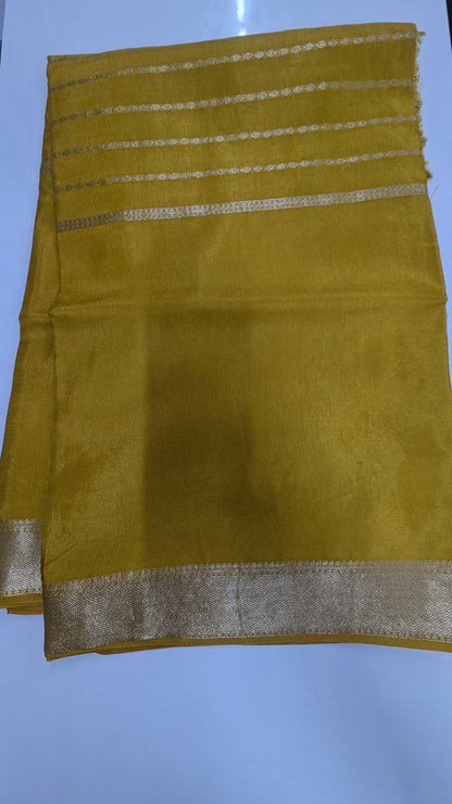Mustard color Semi Crepe Silk Saree with Center Zari Lines and Border