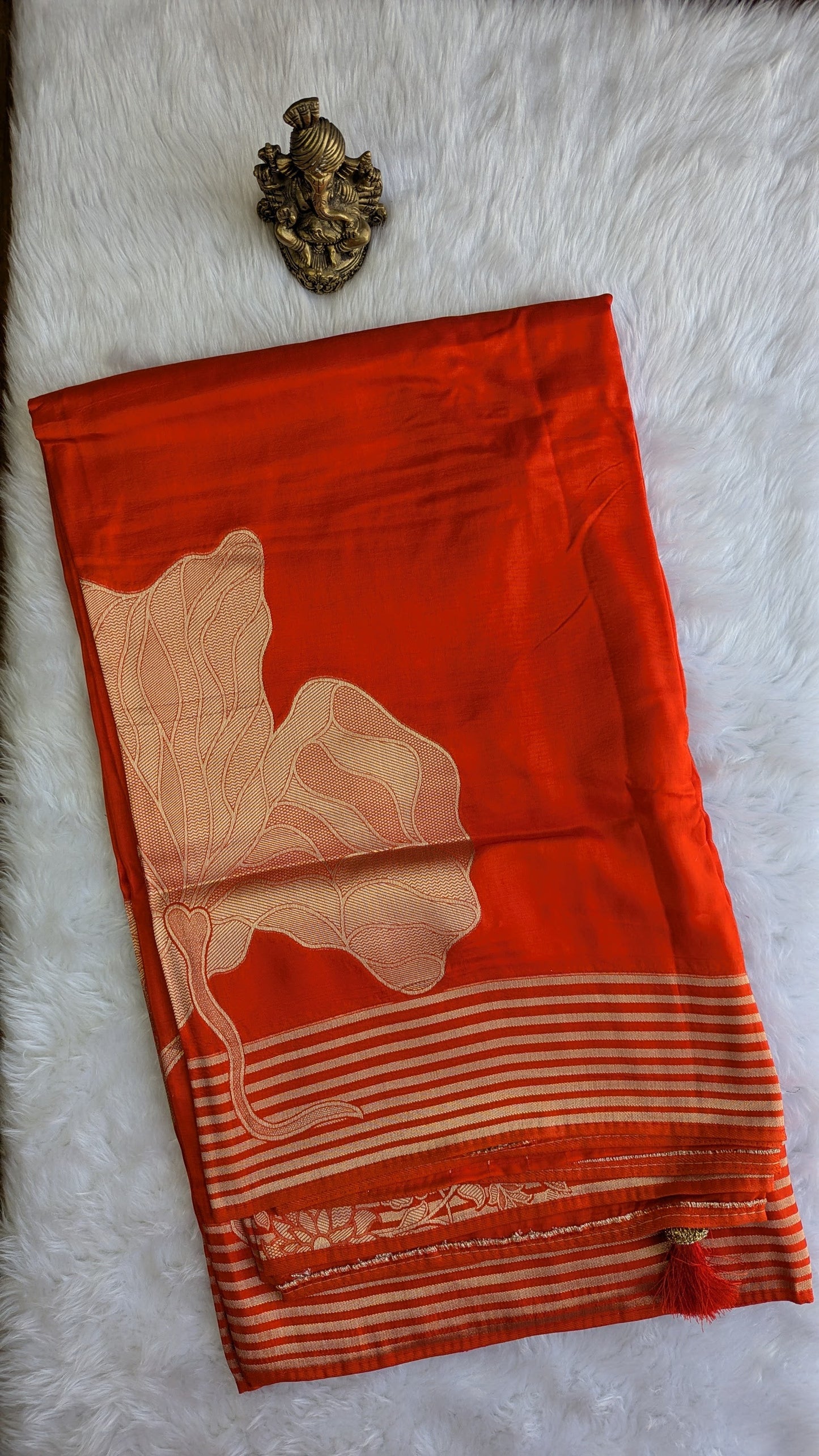 Rust Orange Crepe Silk with Big Zari Flower Motifs